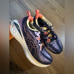 ASICS Women's Gel-Cumulus 25 running shoes in the Midnight/Papaya colorway